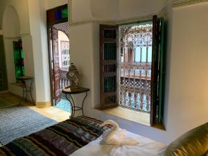 Postel nebo postele na pokoji v ubytování Riad Malida Marrakech