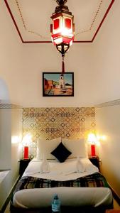 Postel nebo postele na pokoji v ubytování Riad Malida Marrakech