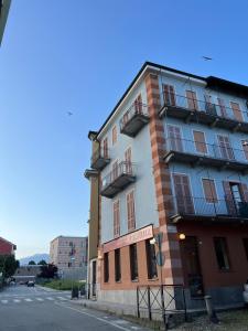 a building on the side of a street at V HOME in Biella