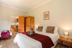 Ένα ή περισσότερα κρεβάτια σε δωμάτιο στο Vredehoek Guest Farm
