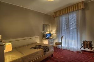 TV a/nebo společenská místnost v ubytování Hotel Terme Principe