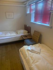 Postel nebo postele na pokoji v ubytování Sønderstrand Downtown Family Rooms ØS47