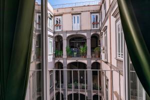 a view from a window of a building at La Smorfia in Naples