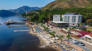 an aerial view of a resort on the water with a beach at Class Unique Beach in Marmaris