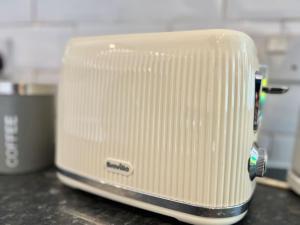 a toaster sitting on top of a counter at Home in Nottingham in Nottingham