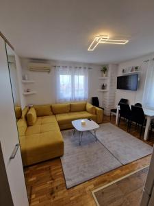 Posezení v ubytování APARTMAN MAOR