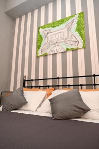 Postel nebo postele na pokoji v ubytování B&B Carlo V - House Hotel