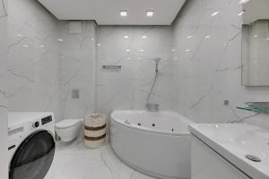 Kúpeľňa v ubytovaní Grand Apartments - Apartament Tre Mare - By the sea