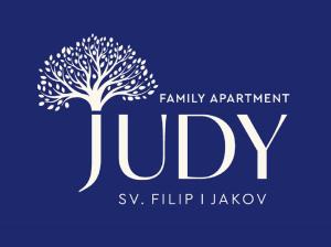 een logo voor een familieafspraak flyer met een boom bij Apartment Judy, Terrace&Garden, 80m from the Beach in Sveti Filip i Jakov