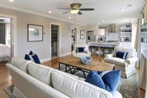 a living room with a couch and a table at El Rey Collection 2 in Tybee Island