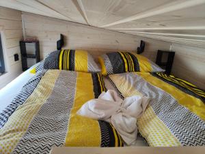 Postel nebo postele na pokoji v ubytování Mariolas Tinyhouse + 32 fotografií