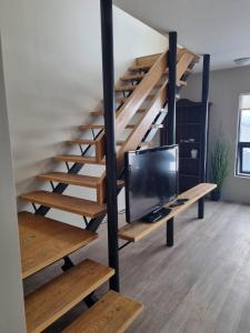 Μια τηλεόραση ή/και κέντρο ψυχαγωγίας στο Guesthouse Maddy