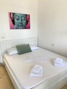 Postel nebo postele na pokoji v ubytování Spile Rooms Lukas