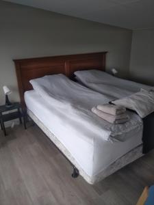 Ένα ή περισσότερα κρεβάτια σε δωμάτιο στο Guesthouse Maddy