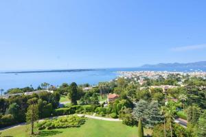 an aerial view of a park next to the water at Apartment in a 8 hectares park incredible view in Cannes