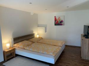 Postel nebo postele na pokoji v ubytování Apartments Nikol&Alzbetka