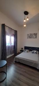Postel nebo postele na pokoji v ubytování Maison cosy avec piscine + 2 fotografie