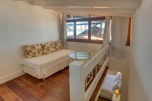 Cama ou camas em um quarto em Chez Louise et Louis Pé na Areia
