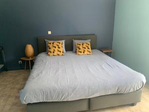 Postel nebo postele na pokoji v ubytování La Maison Ardoise