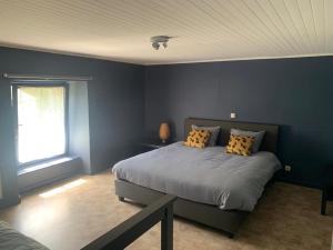 Postel nebo postele na pokoji v ubytování La Maison Ardoise