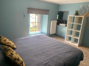 Postel nebo postele na pokoji v ubytování La Maison Ardoise