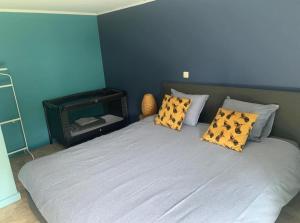 Postel nebo postele na pokoji v ubytování La Maison Ardoise