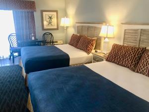 Beach View Hotel客房内的一张或多张床位