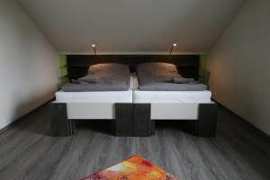 Katil atau katil-katil dalam bilik di Ferienwohnung Schauenburg