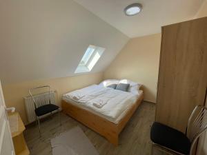 Posteľ alebo postele v izbe v ubytovaní Siófok apartman