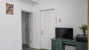 TV a/nebo společenská místnost v ubytování Casa Bendis