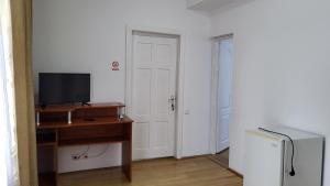 TV a/nebo společenská místnost v ubytování Casa Bendis