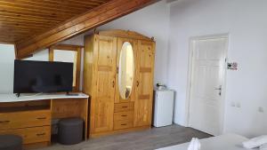 TV a/nebo společenská místnost v ubytování Casa Bendis