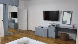 TV a/nebo společenská místnost v ubytování Casa Bendis