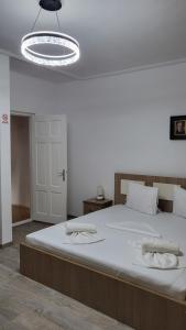Postel nebo postele na pokoji v ubytování Casa Bendis
