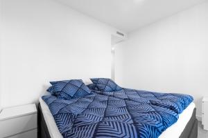 Posteľ alebo postele v izbe v ubytovaní Beachfront Apartment 034 + 19 fotografií