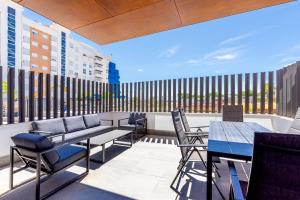 Balkón alebo terasa v ubytovaní Beachfront Apartment 034