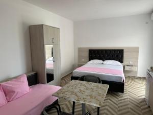 Voodi või voodid majutusasutuse Apartments Flamida toas