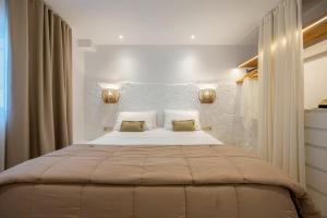 Voodi või voodid majutusasutuse Euphoria Suites and Spa toas