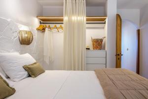 Voodi või voodid majutusasutuse Euphoria Suites and Spa toas