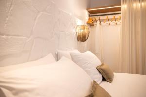 Voodi või voodid majutusasutuse Euphoria Suites and Spa toas