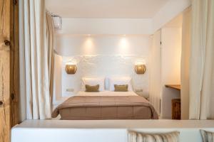 Voodi või voodid majutusasutuse Euphoria Suites and Spa toas
