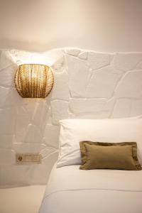 Voodi või voodid majutusasutuse Euphoria Suites and Spa toas