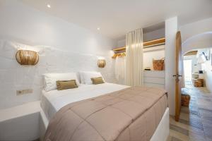 Voodi või voodid majutusasutuse Euphoria Suites and Spa toas