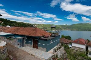 a house with a view of a lake at ERTEO Guest House in Pogradec
