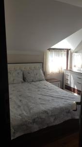 Postel nebo postele na pokoji v ubytování Topçu Villa