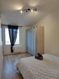 Posteľ alebo postele v izbe v ubytovaní Moderne et chaleureux duplex en centre-ville