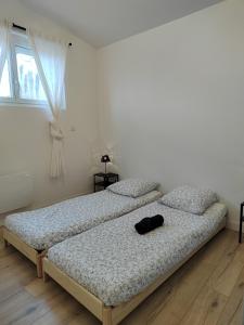 Posteľ alebo postele v izbe v ubytovaní Moderne et chaleureux duplex en centre-ville
