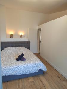 Posteľ alebo postele v izbe v ubytovaní Moderne et chaleureux duplex en centre-ville