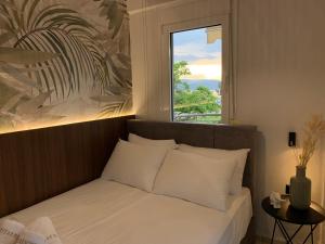 Ένα ή περισσότερα κρεβάτια σε δωμάτιο στο Vryzas Resort