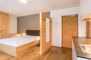 A bed or beds in a room at Residence Stefansdorf